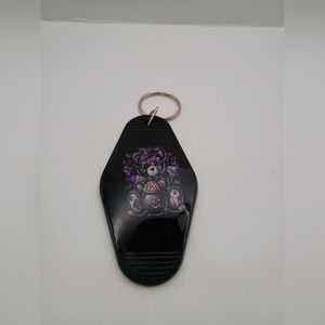 Black Keychain with Colorful Bear Design